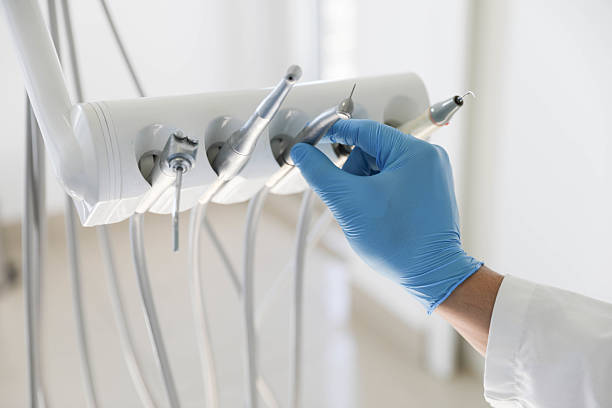 Professional Tooth Extraction technician working in Orange City, IA